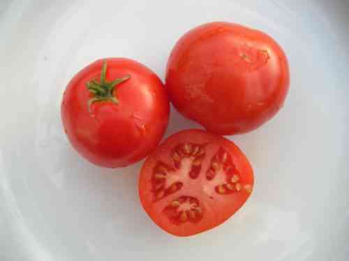 Merkmale der Tomatensorte Sibirische Überraschung