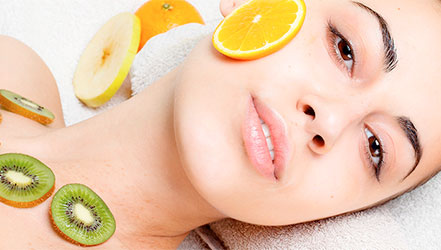 Apple and other fruits in a homemade face mask