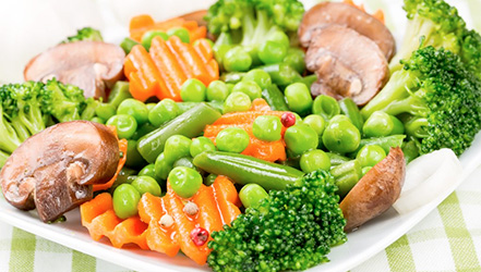 Peas and other steamed vegetables
